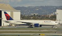 N704DK @ KLAX - Taxiing to gate at LAX - by Todd Royer