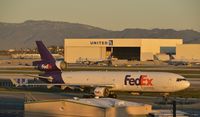 N522FE @ KLAX - Taxiing to gate at LAX - by Todd Royer