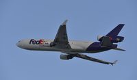 N574FE @ KLAX - Departing LAX - by Todd Royer