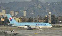 HL7619 @ KLAX - Taxiing to gate at LAX - by Todd Royer