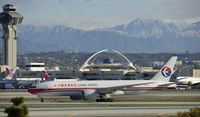 B-2082 @ KLAX - Taxiing to parking at LAX - by Todd Royer