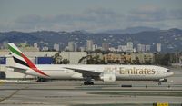 A6-EGF @ KLAX - Taxiing to gate at LAX - by Todd Royer