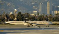 B-2032 @ KLAX - Taxiing to gate at LAX - by Todd Royer