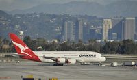 VH-OQA @ KLAX - Pulling up tp gate at LAX - by Todd Royer