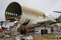G-CEAH @ EGHH - Nearing the end, but front fuselage is to have an afterlife - by John Coates