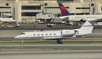 N71TV @ KLAX - Taxiing for departure - by Todd Royer
