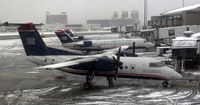 N914HA @ KBOS - In the snow - BostonPhotp with the permission of Ronbert Norville - by Robert Norville