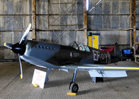 G-CENI @ EGSP - in hangar at Sibson, 80th scale of Spitfire - by Garry Lakin