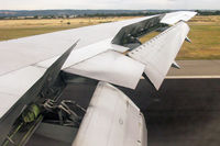 VH-OGN @ YPAD - Qantas Boeing 767-338 lands at Adelaide International, November 9th 2004. - by Malcolm Clarke