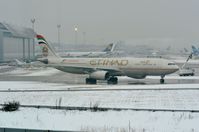 A6-AFF @ EDDL - Etihad A333 lining up for its de-icing treatment. - by FerryPNL