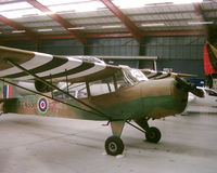 G-AJGJ @ EGHH - In the Bournemouth Aviation Museum hangar. - by Howard J Curtis