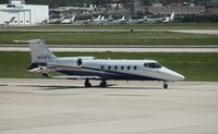 N263FX @ KSAT - Learjet 60