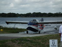 N6386K @ FA08 - Coming ashore from Lake Agnes during the 2013 Splash-In - by Jim Uber