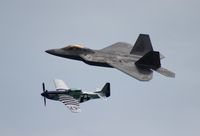 N351DT - Crazy Horse 2 with F-22 over Cocoa Beach FL