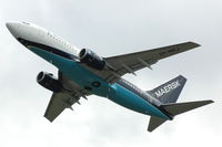 OY-MRJ @ EHAM - Maersk Boeing 737-700 after take off from Amsterdam Schiphol airport, the Netherlands. - by Henk van Capelle