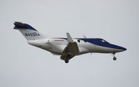 N420HA @ ORL - Honda HA-420 landing at Orlando Exec for NBAA in high crosswinds due to Hurricane Sandy passing by off shore