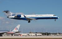 N502MJ @ MIA - United Express CRJ-700 - by Florida Metal