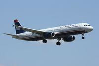 N520UW @ DFW - US Airways landing at DFW Airport - by Zane Adams