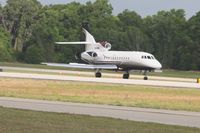 N40ML @ KLAL - Landing RWY 9R at Lakeland, FL during Sun N Fun 2013 - by Bob Simmermon