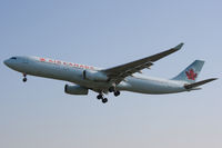 C-GHKW @ EGLL - Air Canada, on approach to runway 27L. - by Howard J Curtis