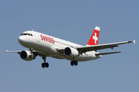 HB-JLS @ EGLL - Swiss, on approach to runway 27L. - by Howard J Curtis