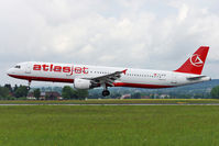 TC-ATB @ OWL - Atlasjet Airbus A321-211 landing in LOWL/LNZ - by Janos Palvoelgyi
