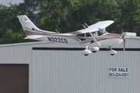 N322CS @ KLAL - Crosswind landing at Sun N Fun 2013 - Lakeland, FL - by Bob Simmermon