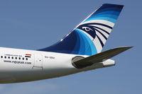 SU-GDU @ EGLL - Close up of the tail of this Egyptair machine on approach to runway 27L. - by Howard J Curtis