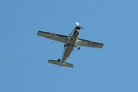 G-SYLV @ EGFH - Skydive Swansea's Grand Caravan climbing out over the airport for drops from 7500 feet and 12000 feet. - by Roger Winser