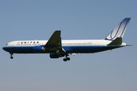 N655UA @ EGLL - United Airlines, on approach to runway 27L. - by Howard J Curtis