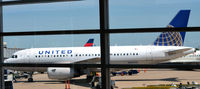 N855UA @ KDCA - At the gate, DCA - by Ronald Barker