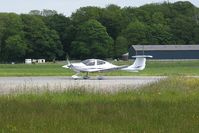 N824US @ EGFE - Visiting DA 40 taxying to the pumps after landing on Runway 22. - by Roger Winser