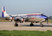 N996DM @ LOWG - Red Bull DC-6 in the morning sun. - by Andreas Müller