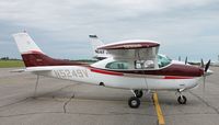 N5249V @ KAXN - Cessna 210L Centurion on the line. - by Kreg Anderson