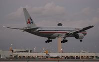 N791AN @ MIA - American 777 landing near dark