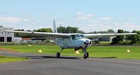 N208TS @ 10D - Cessna 208 Grand Caravan of Westside Skydivers taxiing in after dropping another load of skydivers in Winsted, MN. - by Kreg Anderson