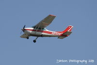N815GK @ KSRQ - Cessna Skylane (N815GK) departs Runway 22 at Sarasota-Bradenton International Airport - by Donten Photography