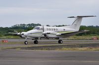 G-FRYI @ EGFH - Visiting Super King Air operated by London Executive Aviation Ltd. taxying to the apron. - by Roger Winser