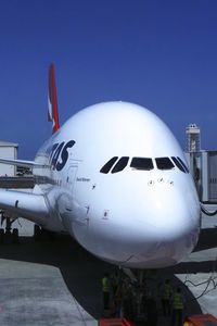 VH-OQI @ KLAX - Qantas David Warren A380-842 taken from inside the new Tom Bradley International Terminal on LAX Appreciation Day. - by speedbrds