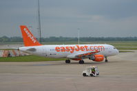G-EZWB @ EGCC - Easyjet Airbus A320-214 taxiing Manchester Airport. - by David Burrell