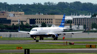 N306JB @ KDCA - Blue Orleans  Takeoff DCA - by Ronald Barker