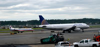 N458UA @ KDCA - N458UA taxing with N804AE behind it - by Ronald Barker