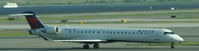 N934XJ @ KJFK - Pinnacle Airlines (Delta Connection cs.), seen here at New York - JFK(KJFK) - by A. Gendorf