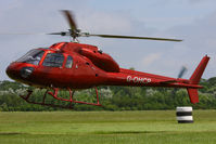 G-OHCP @ EGBT - being used for ferrying race fans to the British F1 Grand Prix at Silverstone - by Chris Hall