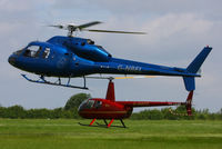 G-NBEL @ EGBT - being used for ferrying race fans to the British F1 Grand Prix at Silverstone - by Chris Hall