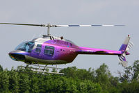 G-JETX @ EGBT - being used for ferrying race fans to the British F1 Grand Prix at Silverstone - by Chris Hall