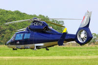 G-CEYU @ EGBT - being used for ferrying race fans to the British F1 Grand Prix at Silverstone - by Chris Hall