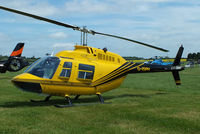 G-ISPH @ EGBT - being used for ferrying race fans to the British F1 Grand Prix at Silverstone - by Chris Hall