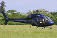 G-JESE @ EGBT - being used for ferrying race fans to the British F1 Grand Prix at Silverstone - by Chris Hall