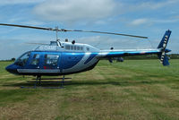 G-OAMI @ EGBT - being used for ferrying race fans to the British F1 Grand Prix at Silverstone - by Chris Hall